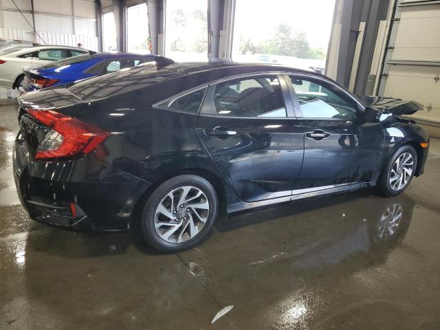 Photo 3 from auction – 2018 HONDA CIVIC EX with VIN 19XFC2F73JE028952
