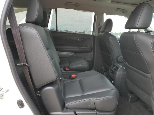 Photo 11 from auction – 2022 HONDA PILOT TOUR with VIN 5FNYF5H65NB030899