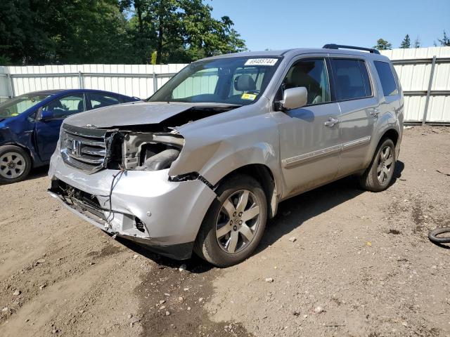 HONDA PILOT TOUR 2014 with VIN 5FNYF4H9XEB036072 - Photo from auction