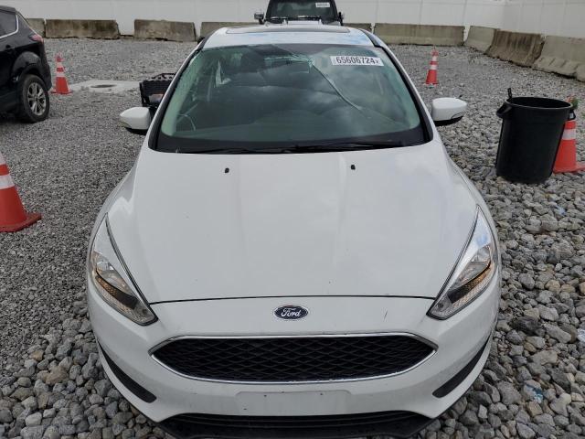Photo 5 from auction – 2015 FORD FOCUS SE with VIN 1FADP3F25FL373815
