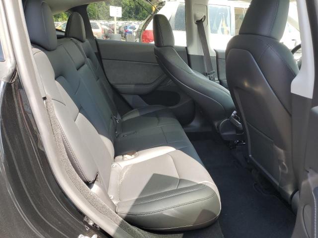 Photo 11 from auction – 2023 TESLA MODEL Y with VIN 7SAYGDEE9PA189656