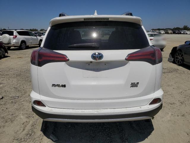 Photo 6 from auction – 2016 TOYOTA RAV4 XLE with VIN 2T3RFREV6GW498306