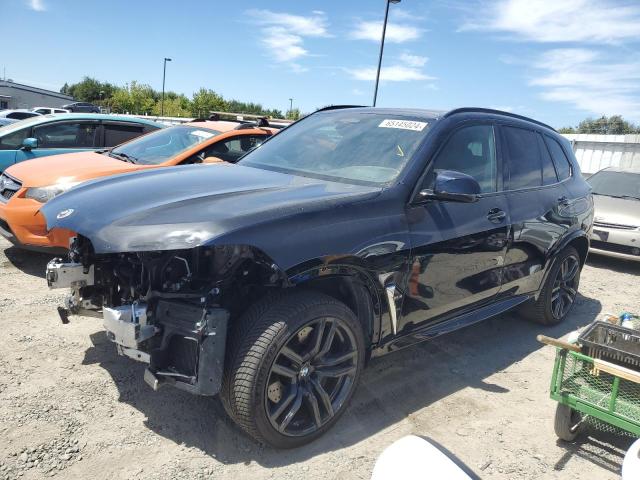 BMW X5 M 2022 with VIN 5YMJU0C02N9M28005 - Photo from auction