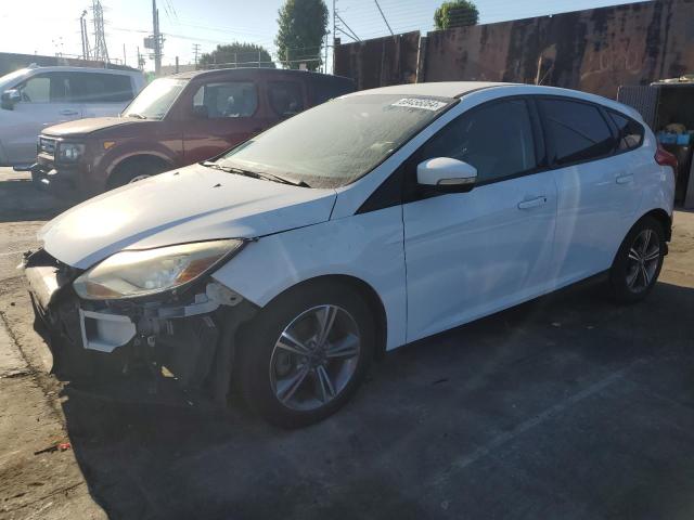 FORD FOCUS SE 2014 with VIN 1FADP3K23EL300219 - Photo from auction