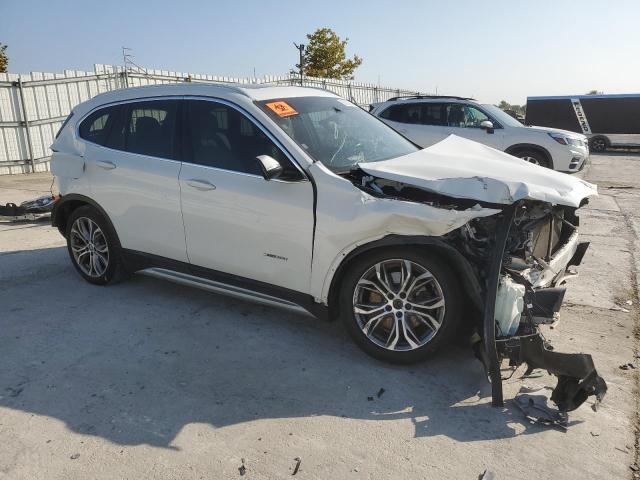 Photo 4 from auction – 2017 BMW X1 XDRIVE2 with VIN WBXHT3C34H5F87289