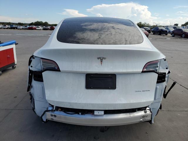 Photo 6 from auction – 2023 TESLA MODEL Y with VIN 7SAYGDEE0PA097139