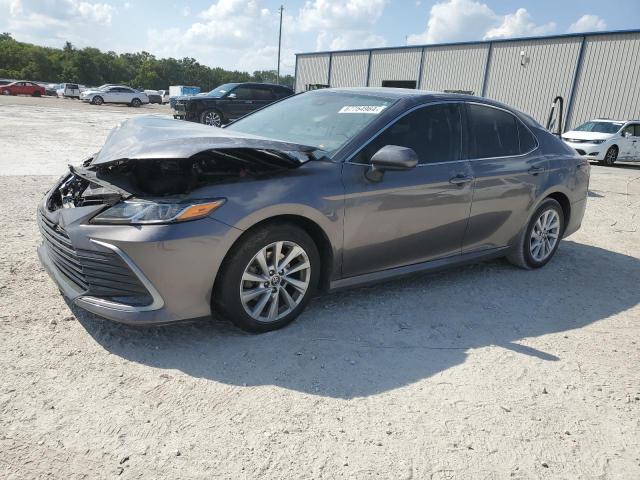 TOYOTA CAMRY LE 2023 with VIN 4T1C11AK2PU106917 - Photo from auction