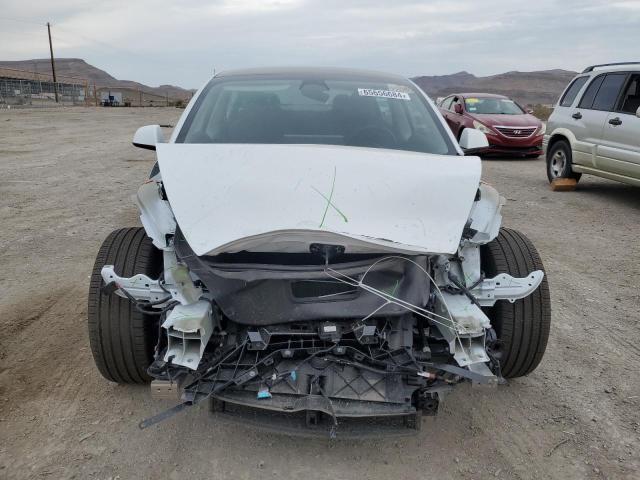 Photo 5 from auction – 2022 TESLA MODEL 3 with VIN 5YJ3E1EB4NF324527