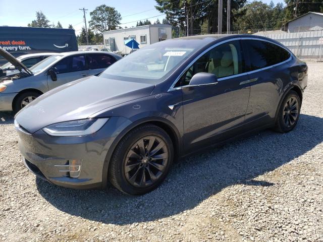 TESLA MODEL X 2018 with VIN 5YJXCDE27JF104690 - Photo from auction