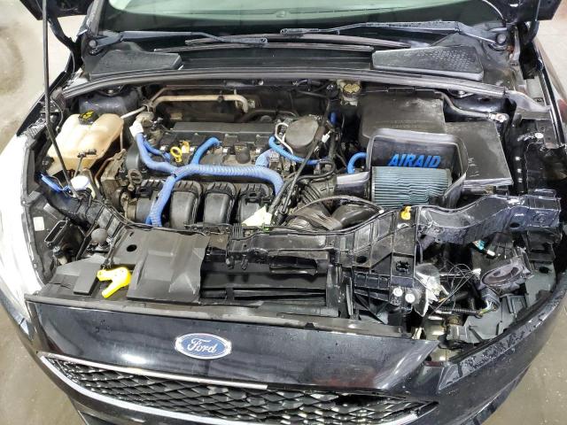 Photo 11 from auction – 2016 FORD FOCUS SE with VIN 1FADP3K2XGL315349