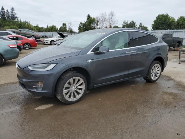 TESLA MODEL X 2016 with VIN 5YJXCBE23GF007628 - Photo from auction