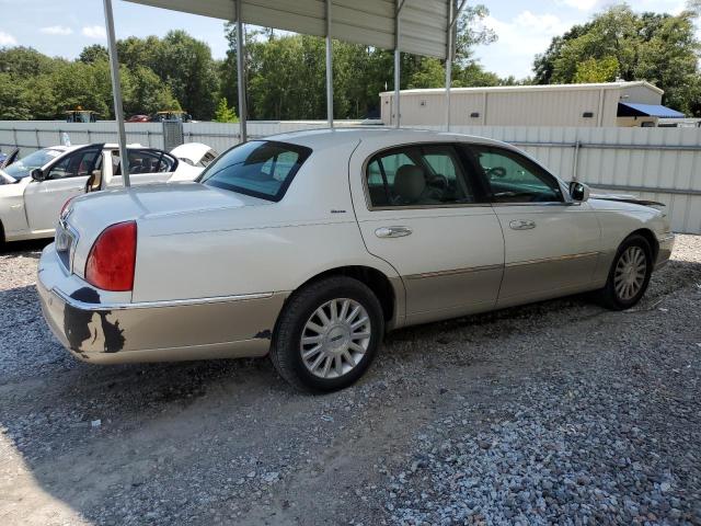Photo 3 from auction – 2004 LINCOLN TOWN CAR U with VIN 1LNHM83W54Y674802