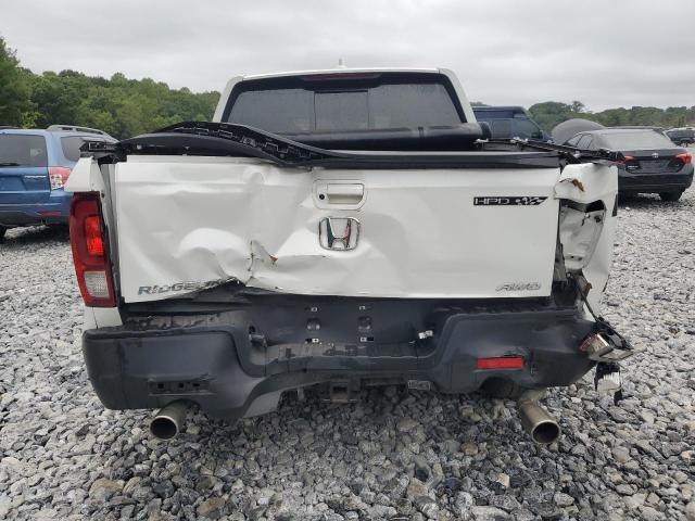 Photo 6 from auction – 2023 HONDA RIDGELINE with VIN 5FPYK3F5XPB028344