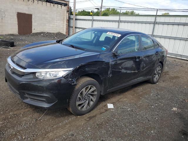 HONDA CIVIC EX 2018 with VIN 2HGFC2F72JH596227 - Photo from auction