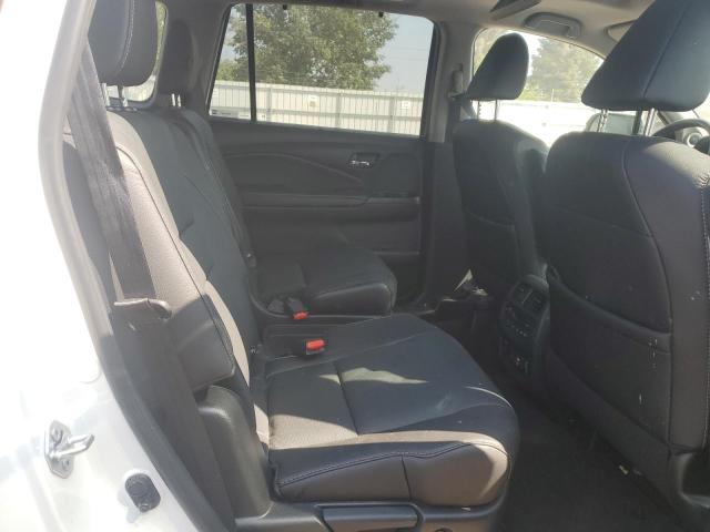 Photo 11 from auction – 2021 HONDA PILOT ELIT with VIN 5FNYF6H04MB049895