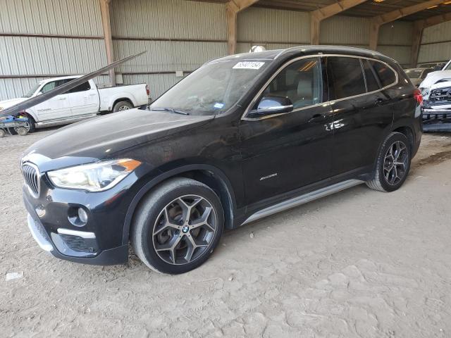 BMW X1 XDRIVE2 2017 with VIN WBXHT3Z35H4A65753 - Photo from auction