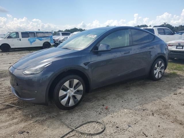 TESLA MODEL Y 2023 with VIN 7SAYGDED6PF965218 - Photo from auction