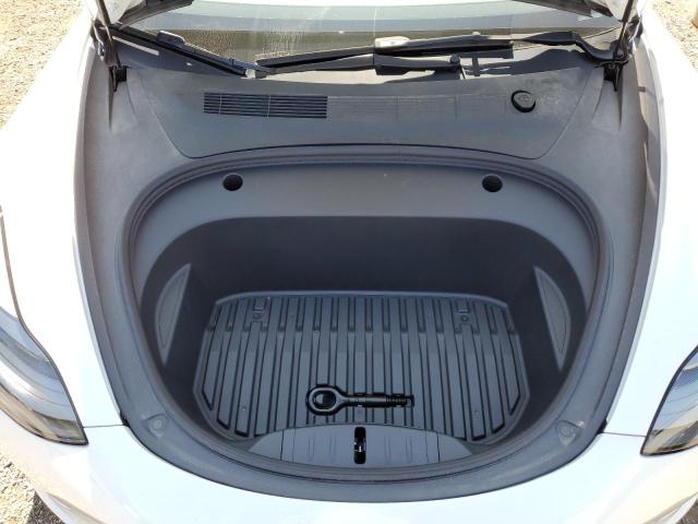 Photo 11 from auction – 2022 TESLA MODEL 3 with VIN 5YJ3E1EA4NF340377