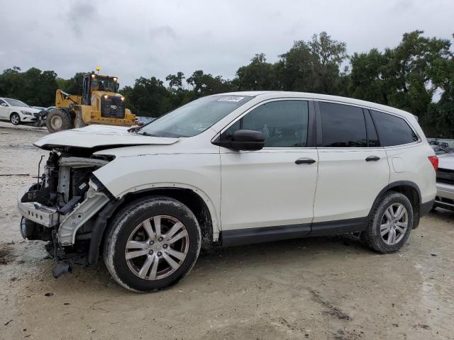 HONDA PILOT LX 2017 with VIN 5FNYF5H17HB012784 - Photo from auction
