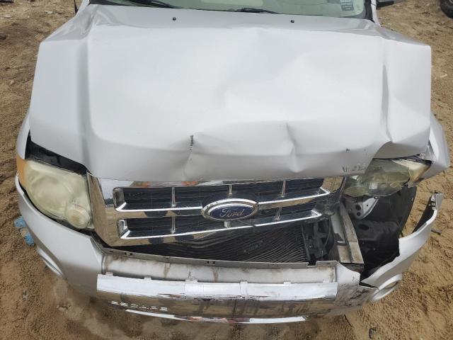 Photo 12 from auction – 2009 FORD ESCAPE LIM with VIN 1FMCU04709KB61261