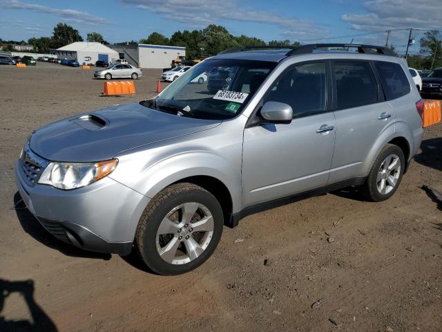 SUBARU FORESTER 2011 with VIN JF2SHGACXBH717420 - Photo from auction
