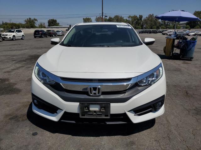 Photo 5 from auction – 2018 HONDA CIVIC EX with VIN JHMFC1F39JX009277