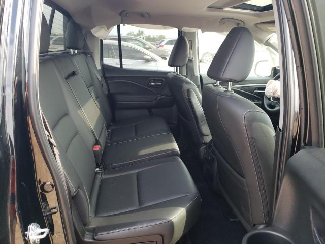 Photo 10 from auction – 2023 HONDA RIDGELINE with VIN 5FPYK3F58PB010196