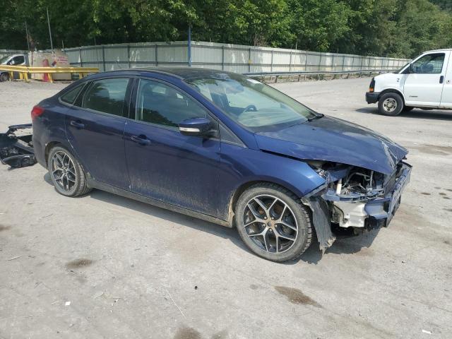 Снимка 4 от търг – 2017 FORD FOCUS SEL с VIN 1FADP3H24HL318062