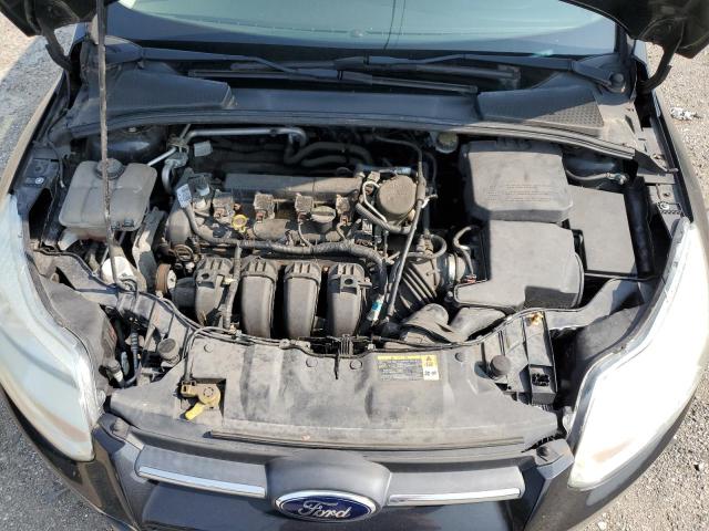 Photo 11 from auction – 2014 FORD FOCUS S with VIN 1FADP3E25EL171153