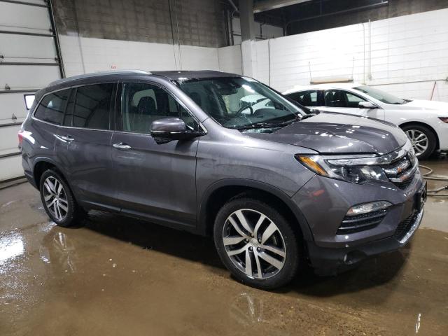 Photo 4 from auction – 2018 HONDA PILOT TOUR with VIN 5FNYF6H94JB033562