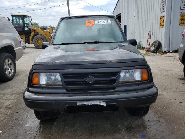 Photo 5 from auction – 1996 SUZUKI SIDEKICK J with VIN 2S3TA02C0T6409050