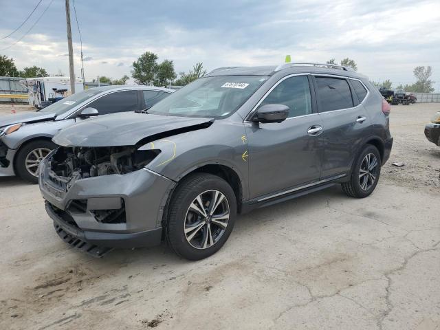 NISSAN ROGUE S 2018 with VIN 5N1AT2MT7JC737543 - Photo from auction