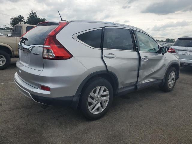 Photo 3 from auction – 2016 HONDA CR-V EXL with VIN 2HKRM4H77GH694395