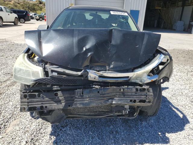 Photo 5 from auction – 2009 FORD FOCUS S with VIN 1FAHP34N79W111747