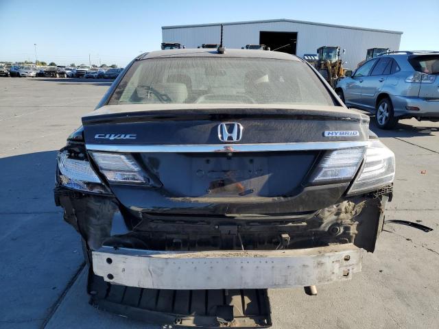 Photo 6 from auction – 2014 HONDA CIVIC HYBR with VIN 19XFB4F36EE201347