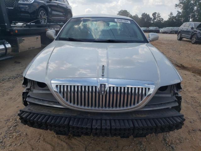 Photo 5 from auction – 2004 LINCOLN TOWN CAR E with VIN 1LNHM81W94Y682713
