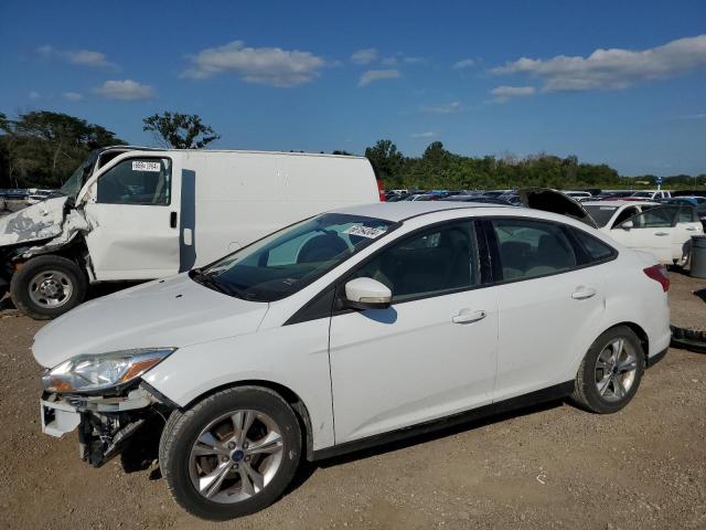 FORD FOCUS SE 2014 with VIN 1FADP3F21EL336436 - Photo from auction