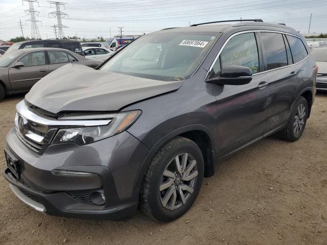 HONDA PILOT EXL 2019 with VIN 5FNYF6H43KB047829 - Photo from auction