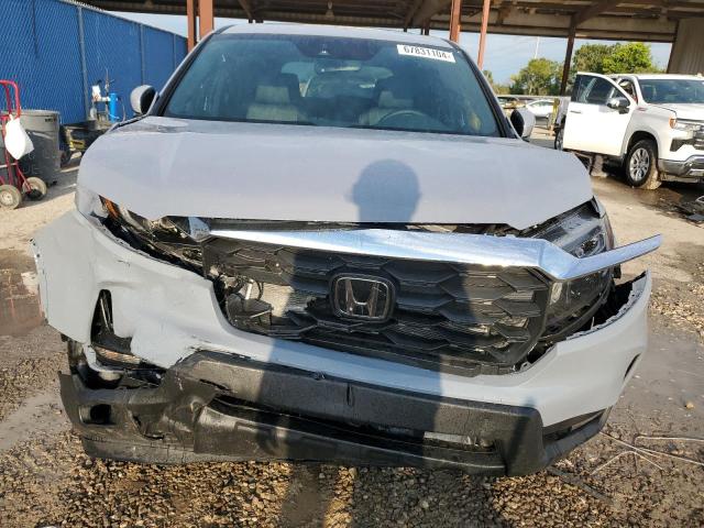 Photo 5 from auction – 2024 HONDA PASSPORT E with VIN 5FNYF8H53RB011976