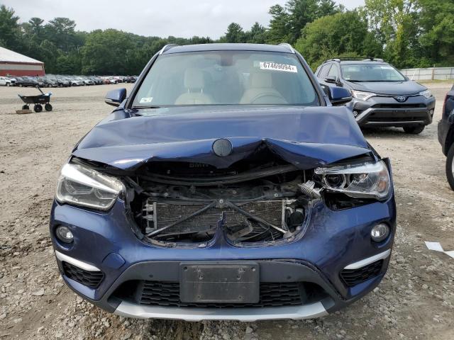 Photo 5 from auction – 2017 BMW X1 XDRIVE2 with VIN WBXHT3C31H5F70353