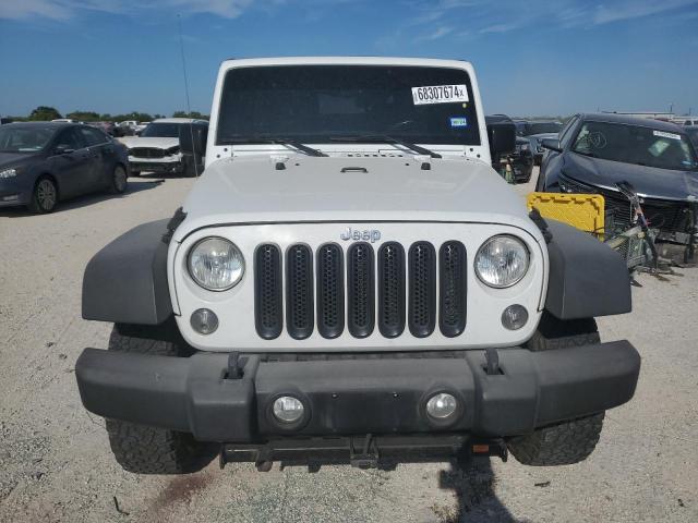 Photo 5 from auction – 2016 JEEP WRANGLER S with VIN 1C4AJWAG9GL228894
