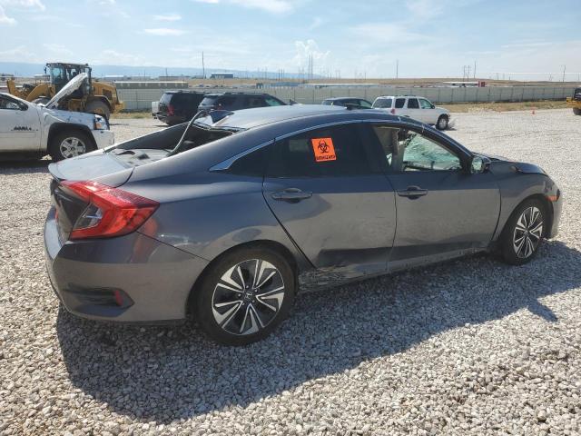 Photo 3 from auction – 2018 HONDA CIVIC EX with VIN JHMFC1F32JX004194