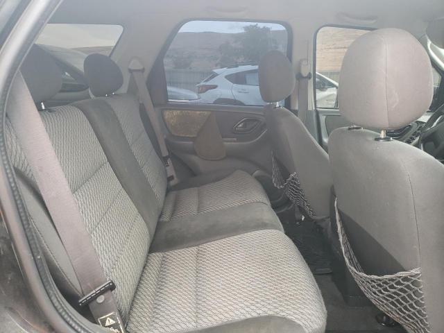 Photo 11 from auction – 2003 FORD ESCAPE XLT with VIN 1FMYU93183KC64071