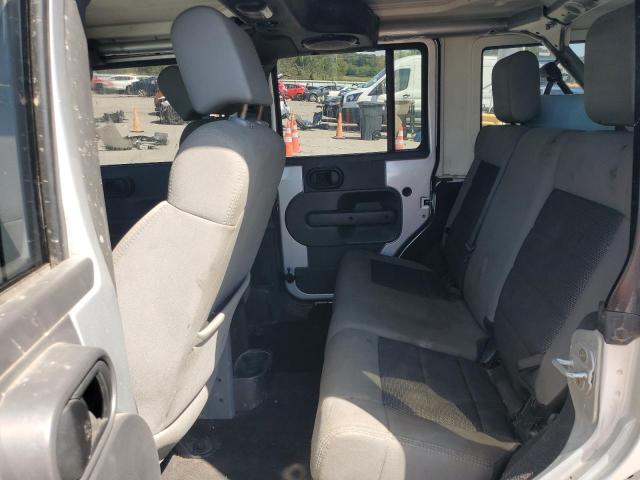 Photo 11 from auction – 2010 JEEP WRANGLER U with VIN 1J4BA5H12AL220105