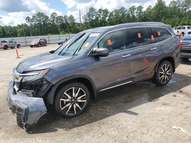 HONDA PILOT ELIT 2019 with VIN 5FNYF6H09KB062090 - Photo from auction