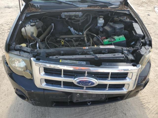 Photo 12 from auction – 2009 FORD ESCAPE XLS with VIN 1FMCU02779KB02128