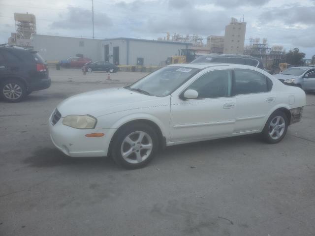 NISSAN MAXIMA GLE 2000 with VIN JN1CA31D2YT761977 - Photo from auction