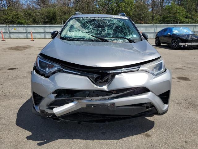 Photo 5 from auction – 2018 TOYOTA RAV4 LE with VIN 2T3BFREV8JW752512