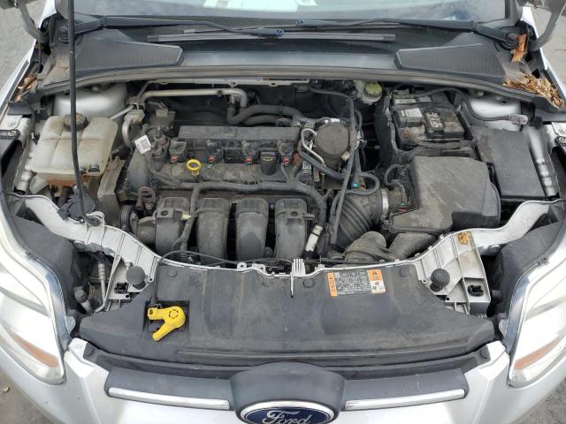 Photo 11 from auction – 2014 FORD FOCUS SE with VIN 1FADP3F2XEL386056