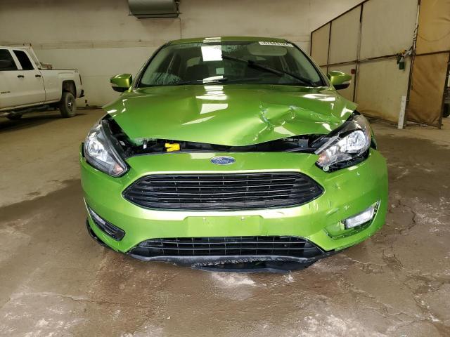 Photo 5 from auction – 2018 FORD FOCUS SE with VIN 1FADP3F24JL260494